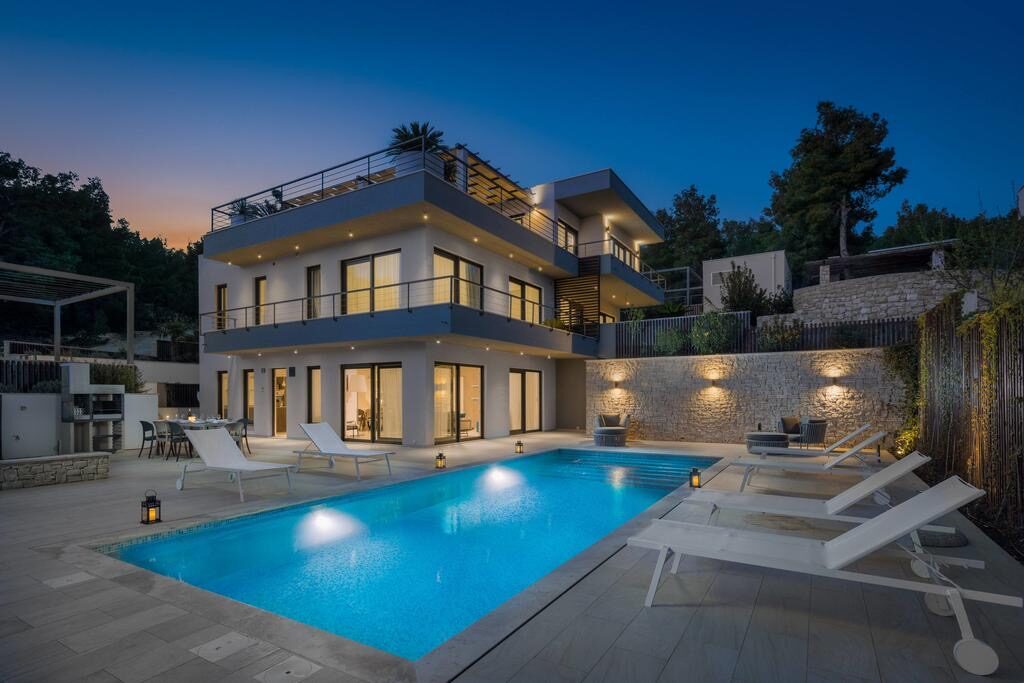Brač Luxury Villa exterior at dusk